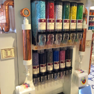 Collect a rainbow of M&Ms at this self-serve candy stop! M&M Bulk Dispensers